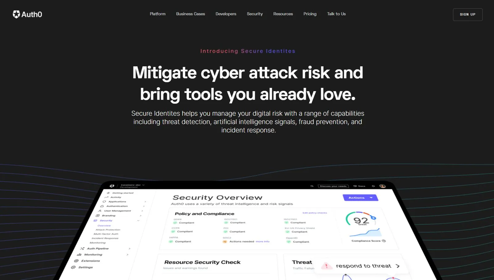 Auth0 marketing page with the headline Mitigate cyber attack risk and bring tools you already love, above a tilted laptop showing a Security Overview dashboard with a compliance score.